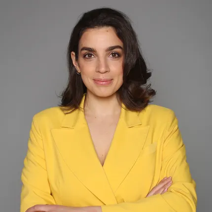 Anna, Pulsoid CEO, in a yellow blazer